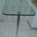 Tampo de mesa com pé em inox